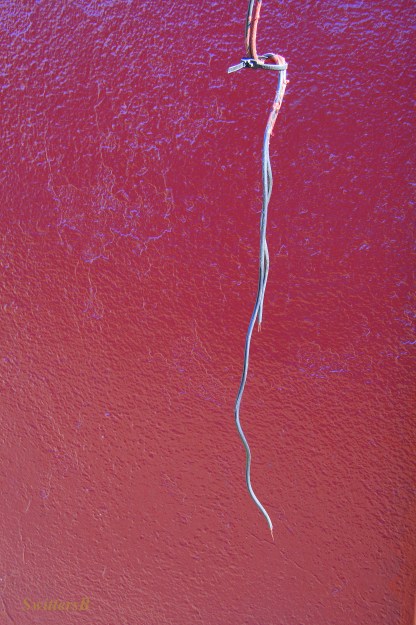 electricity-loose wire-red wall-photography-SwittersB
