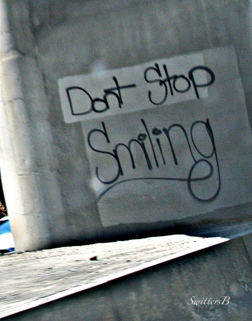 freeway-graffiti-sign-tag-smile-mental health-photography-SwittersB
